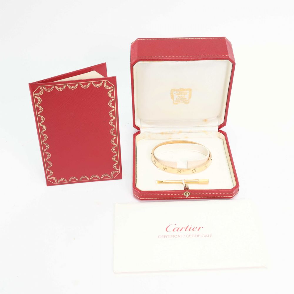 Cartier - 18K Love Bracelet Yellow-Gold. Size: 19. Including Box, Papers,