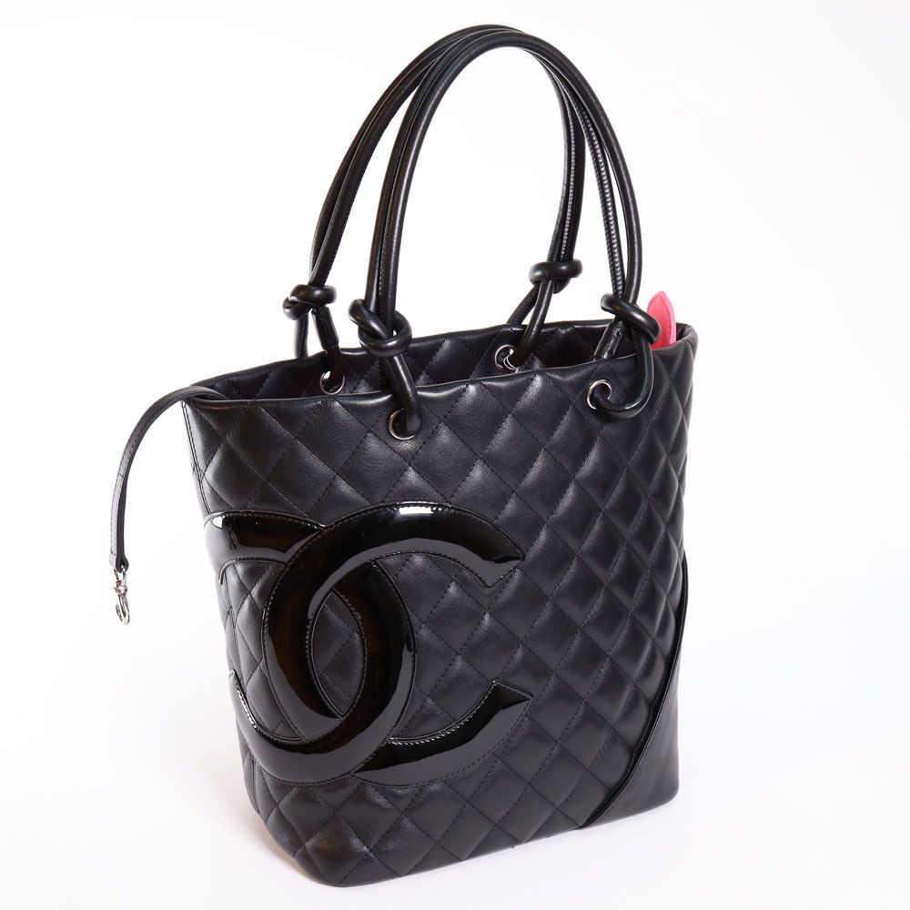 CHANEL - Black White Quilted Lambskin Petite Ligne Cambon Bucket Bag